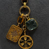 Vignette - Cluster of Diamond Charm, Disc & Blue Carved Stone